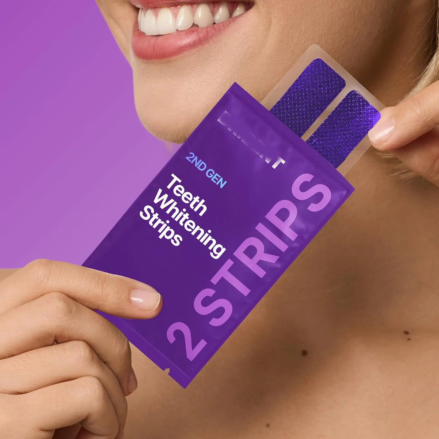 Balbaz teeth whitening strips partially applied on teeth, showcasing the dental whitening product for brighter smiles.