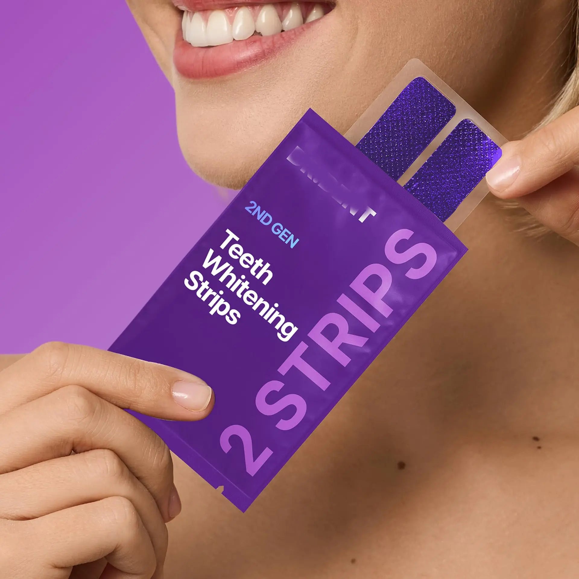 Balbaz teeth whitening strips partially applied on teeth, showcasing the dental whitening product for brighter smiles.